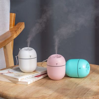 अल्ट्रासोनिक 250ml मिनी ह्यूमिडिफायर रंगीन नाइट लाइट के साथ अरोमा ऑयल डिफ्यूज़र 100g
