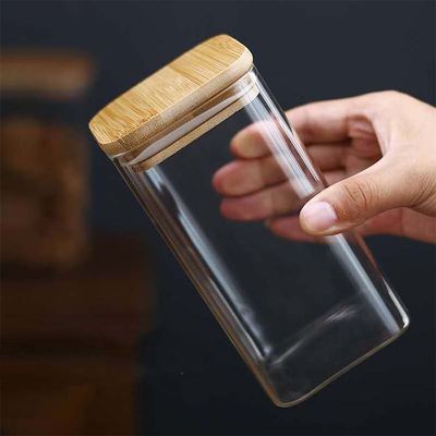 बांस लकड़ी के ढक्कन के साथ आधुनिक डिजाइन खाद्य भंडारण कंटेनर 300ml 500ml मसाला ग्लास जार